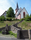 Die Kirche in Christes und ein ulkiger Brunnen